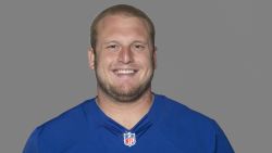 FILE - This 2012 file photo, shows Mitch Petrus of the New York Giants NFL football team. Officials say Petrus, a former Arkansas offensive lineman who later won a Super Bowl with the New York Giants, has died in Arkansas of apparent heat stroke. He was 32.  Pulaski County Coroner Gerone Hobbs says Petrus died Thursday, July 18, 2019, at a North Little Rock hospital. Hobbs says Petrus had worked outside all day at his family shop, and that his cause of death is listed as heat stroke. (AP Photo/File)