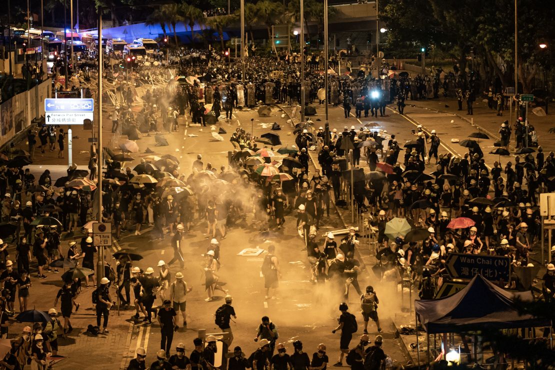 Police fire tear gas at protesters outside the Legislative Council Complex in the early hours of July 2, 2019 in Hong Kong.