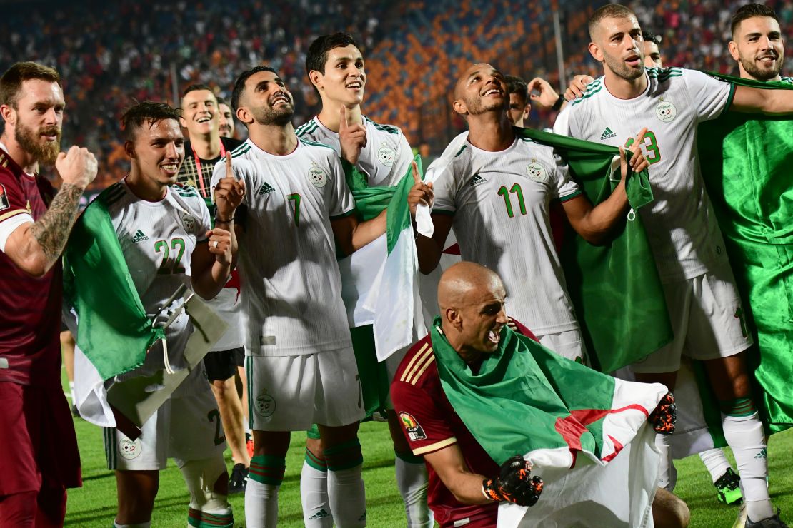 Algerian players celebrate with their fans after winning the 2019 Africa Cup of Nations.