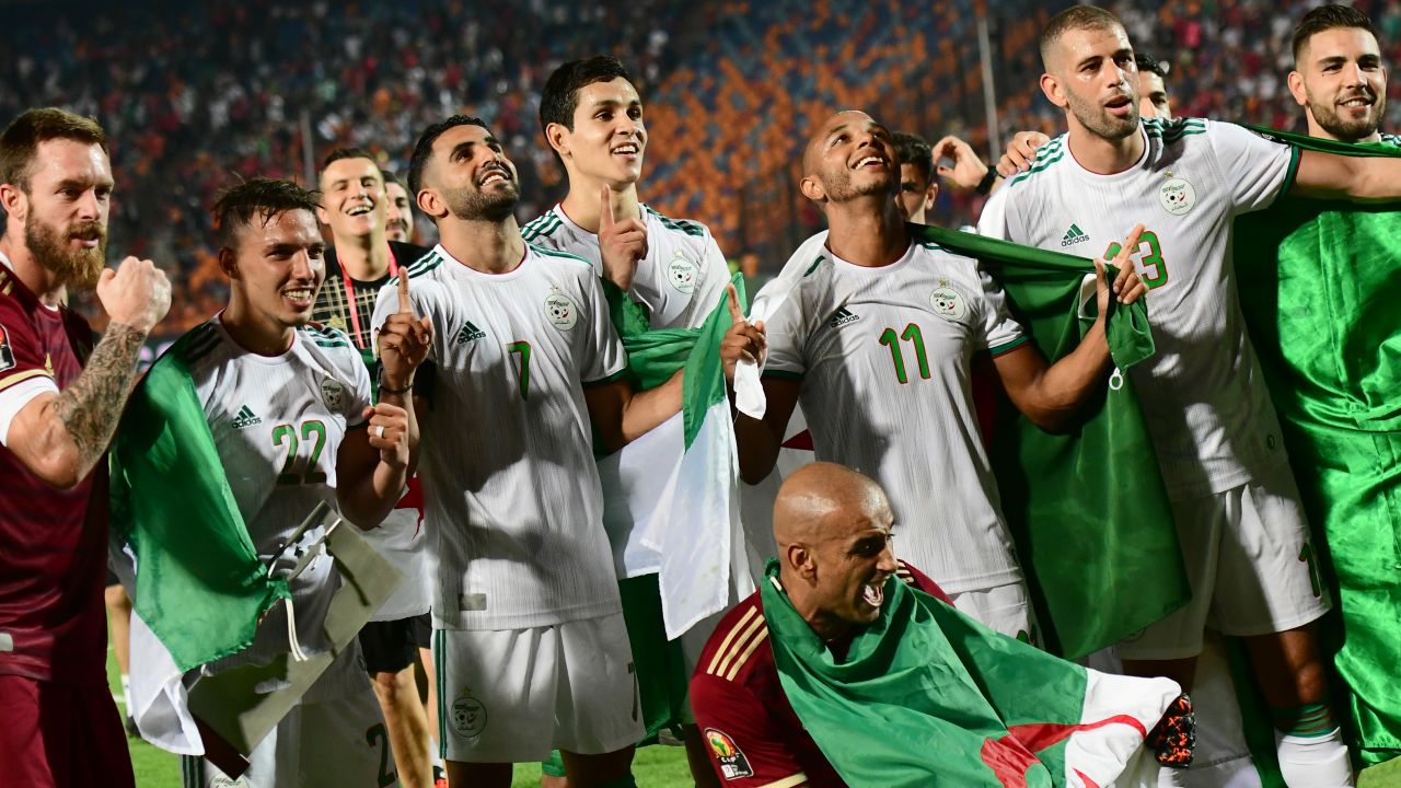 Algerian players celebrate with their fans after winning the 2019 Africa Cup of Nations.