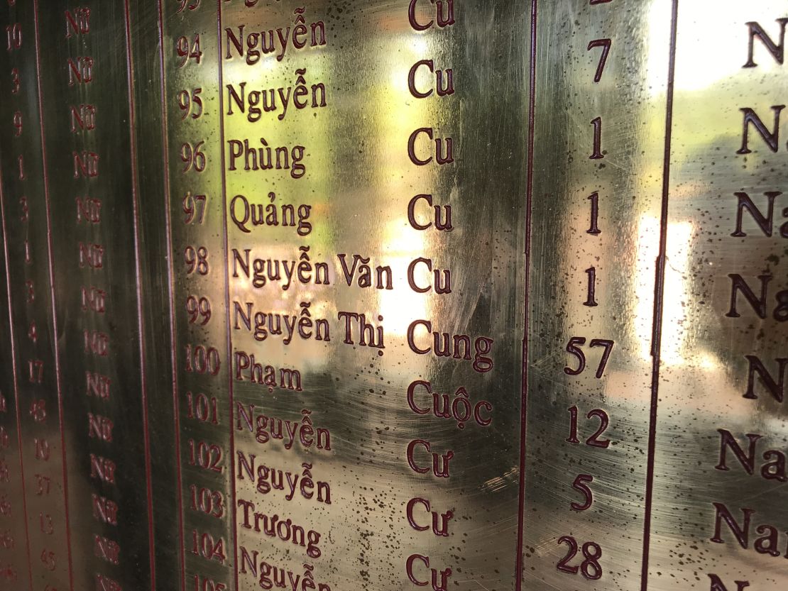 The names of three 1-year-olds, victims of the My Lai massacre, are grouped together on a memorial wall at a museum in Son My, Vietnam.