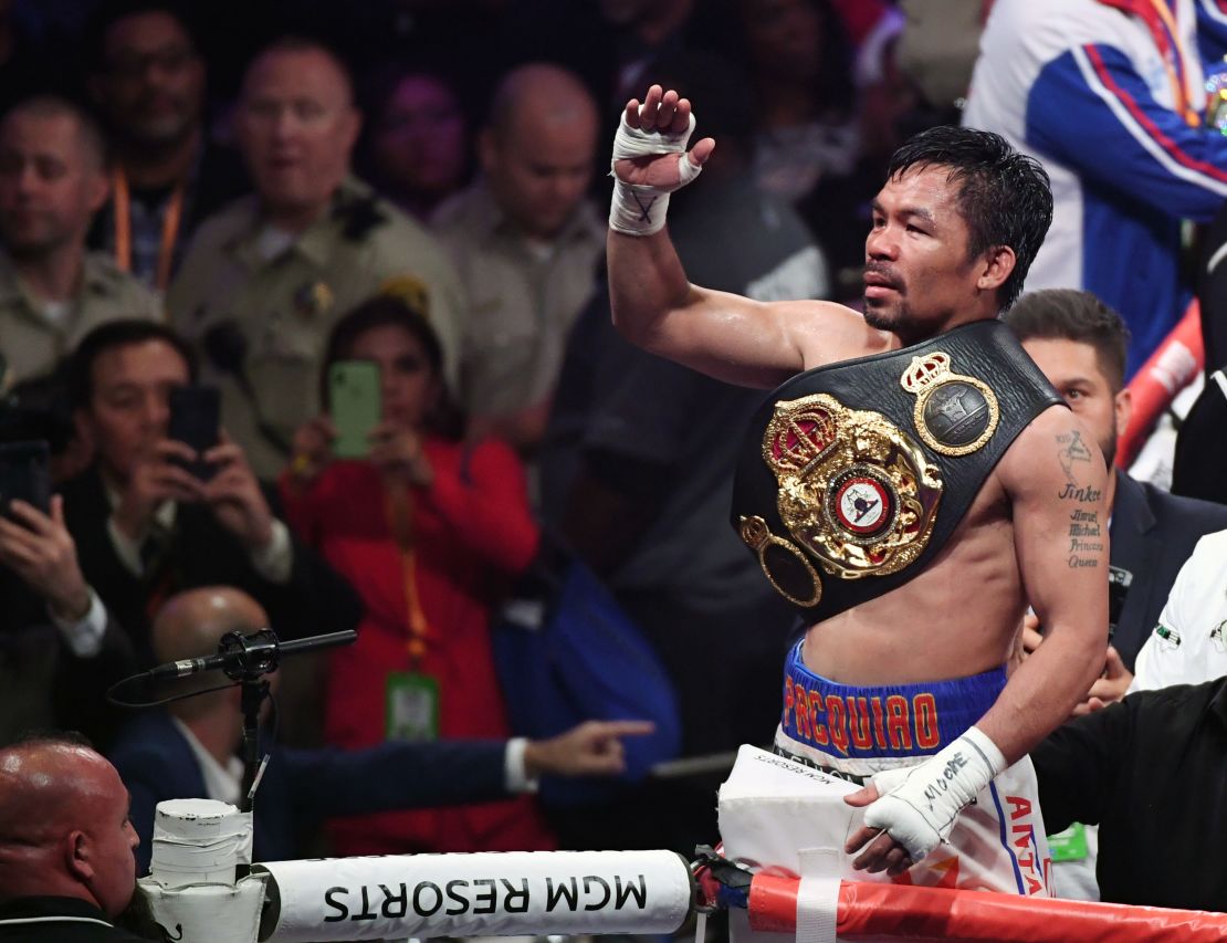 Manny Pacquiao sports another belt in his legendary boxing career. 