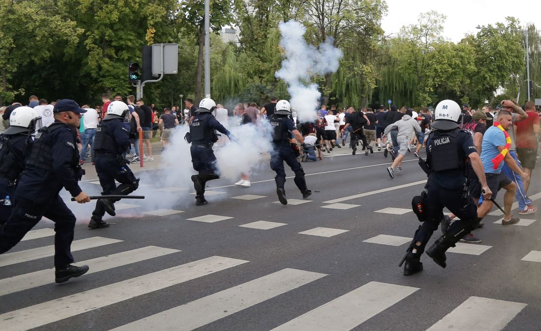 Riot police deployed stun grenades and pepper spray to clear far-right protesters.