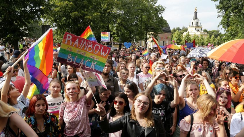 People hold flags and placards during the first gay pride march on July 20, 2019 in the city of Bialystok, in eastern Poland. (Photo by Jerzy Baliski / AFP)        (Photo credit should read JERZY BALISKI/AFP/Getty Images)