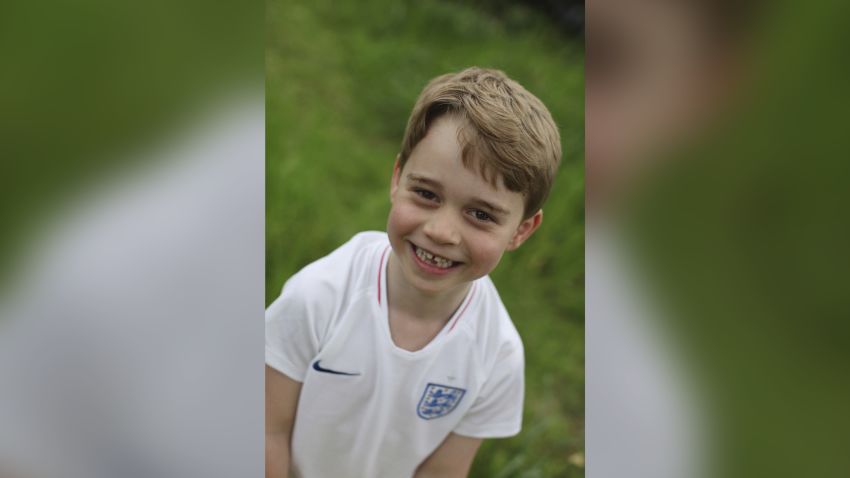 In this undated photo released by the Duke and Duchess of Cambridge on Sunday, July 21, 2019, Britain's Prince George poses for a photo taken by his mother, Kate, the Duchess of Cambridge, in the garden of their home at Kensington Palace, London. Prince George will celebrate his sixth birthday on Monday, July 22. (The Duchess of Cambridge via AP)
