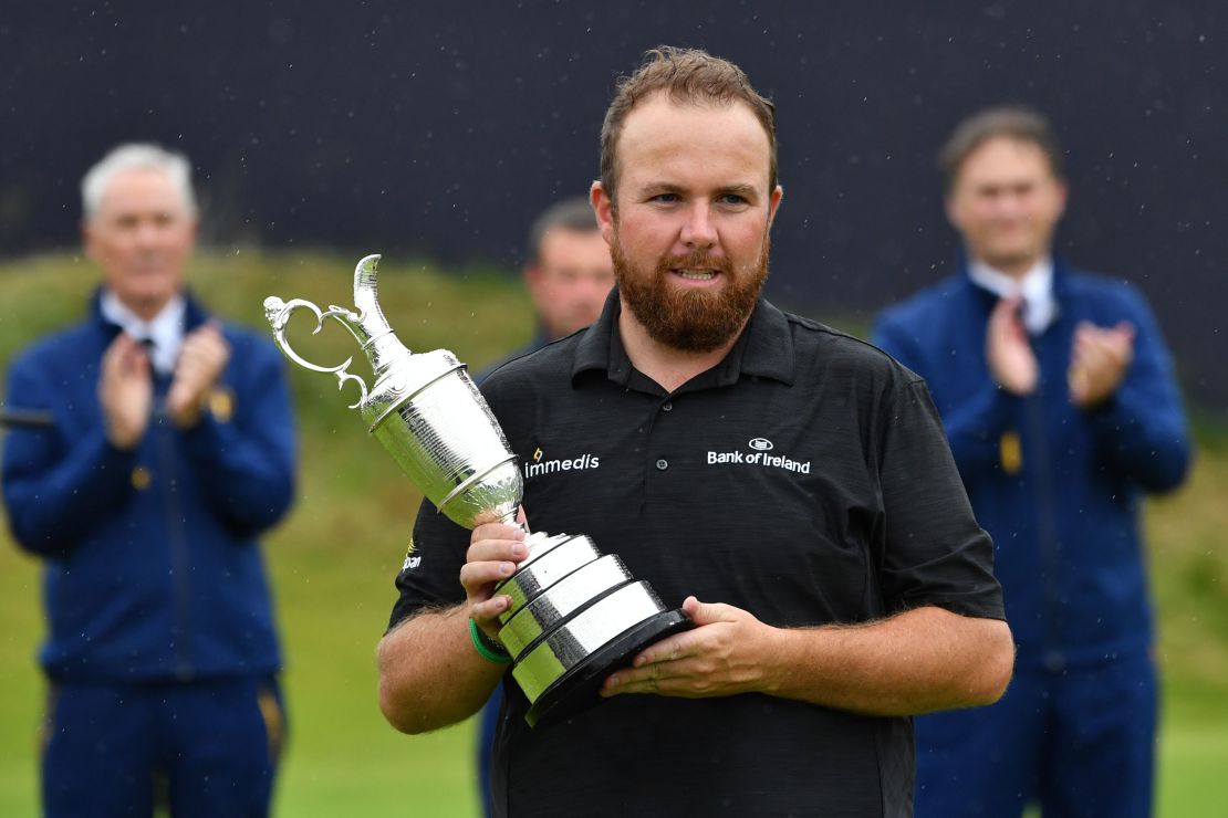 Shane Lowry cradles the Claret Jug for winning the Open. 