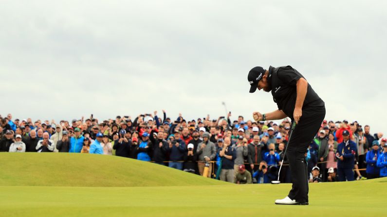 Shane Lowry of Ireland reacts to his birdie putt on the 15th green during the final round of the 148th Open Championship held at Royal Portrush Golf Club in Portrush, Northern Ireland, on Sunday, July 21.<a href="index.php?page=&url=https%3A%2F%2Fwww.cnn.com%2F2019%2F07%2F21%2Fsport%2Fshane-lowry-open-championship-royal-portrush-final-day-spt-intl%2Findex.html" target="_blank"> Lowry</a>, who led the tournament going into the final round, finished six strokes ahead of the field to win his first major championship.<br />
