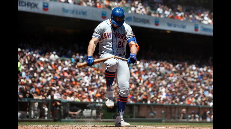 Pete Alonso of the New York Mets breaks his bat over his knee after striking out against the San Francisco Giants during the third inning at Oracle Park in San Francisco, on Sunday, July 21.