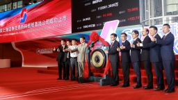 People attend an opening ceremony of the Shanghai Stock Exchange's Sci-Tech Innovation Board in Shanghai on July 22, 2019. - Trading begins on July 22 on a new Nasdaq-style technology board in Shanghai that represents one of China's most significant market reforms, and a potential weapon in its growing tech rivalry with the United States. Twenty-five stocks debuted on the Shanghai Stocks Exchange's Sci-Tech Innovation Board -- dubbed the STAR Market -- in which listing and trading rules have been eased to help channel funding to start-ups. (Photo by STR / AFP) / China OUT        (Photo credit should read STR/AFP/Getty Images)