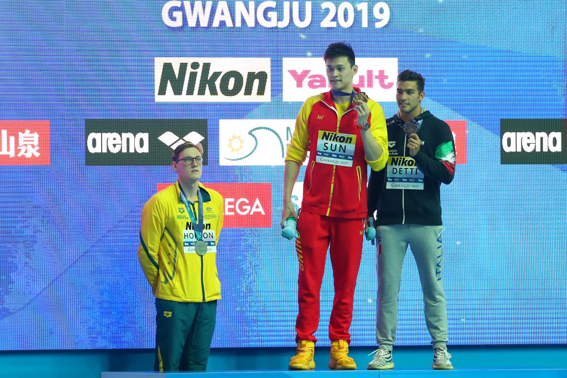 Mack Horton (left) refused to share the podium with Yang (center).