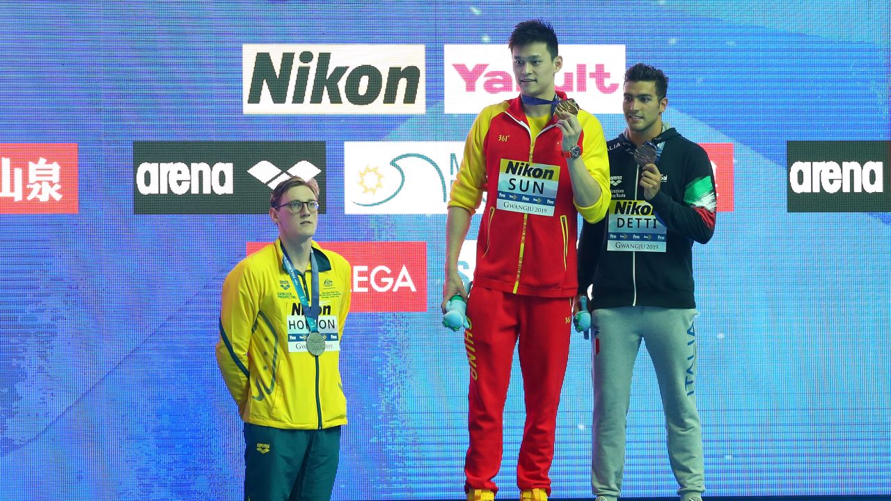 Mack Horton (left) refused to share the podium with Yang (center).