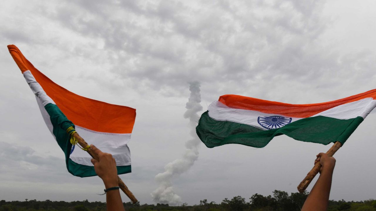 Flags fly as the Chandrayaan-2 launches in Sriharikota in the state of Andhra Pradesh on Monday. 