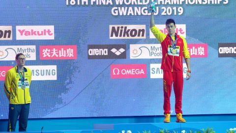Silver medalist Mack Horton of Australia and gold medalist Sun Yang of China pose during the medal ceremony for Men's 400m Freestyle Final on day one of the Gwangju 2019 FINA World Championships at Nambu International Aquatics Centre on July 21, 2019 in Gwangju, South Korea. 