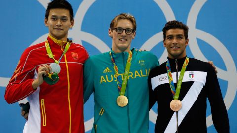 Silver medalist Sun Yang of China, gold medal medalist Mack Horton of Australia and bronze medalist Gabriele Detti of Italy pose during the medal ceremony for the Final of the Men's 400m Freestyle on Day one of the Rio 2016 Olympic Games at the Olympic Aquatics Stadium on August 6, 2016 in Rio de Janeiro, Brazil.