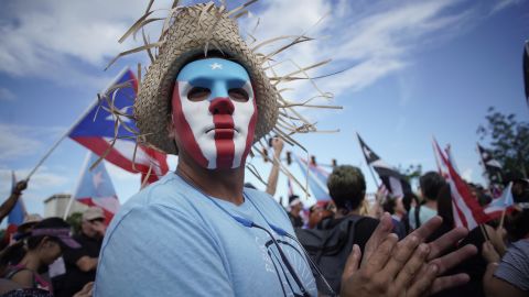 Demonstrators fill the Las Americas Highway in San Juan on Monday.