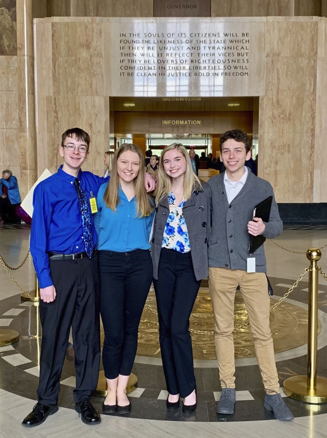 Sam Adamson, from left, Lori Riddle, Hailey Hardcastle and Derek Evans at the Oregon State Capitol in Salem. 