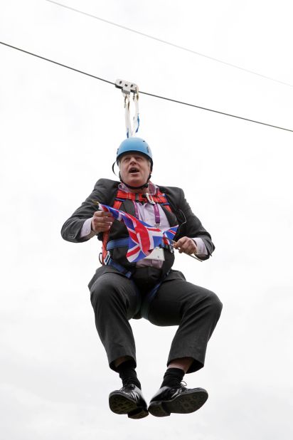 Johnson gets stuck on a zip line during an event in London's Victoria Park in August 2012.