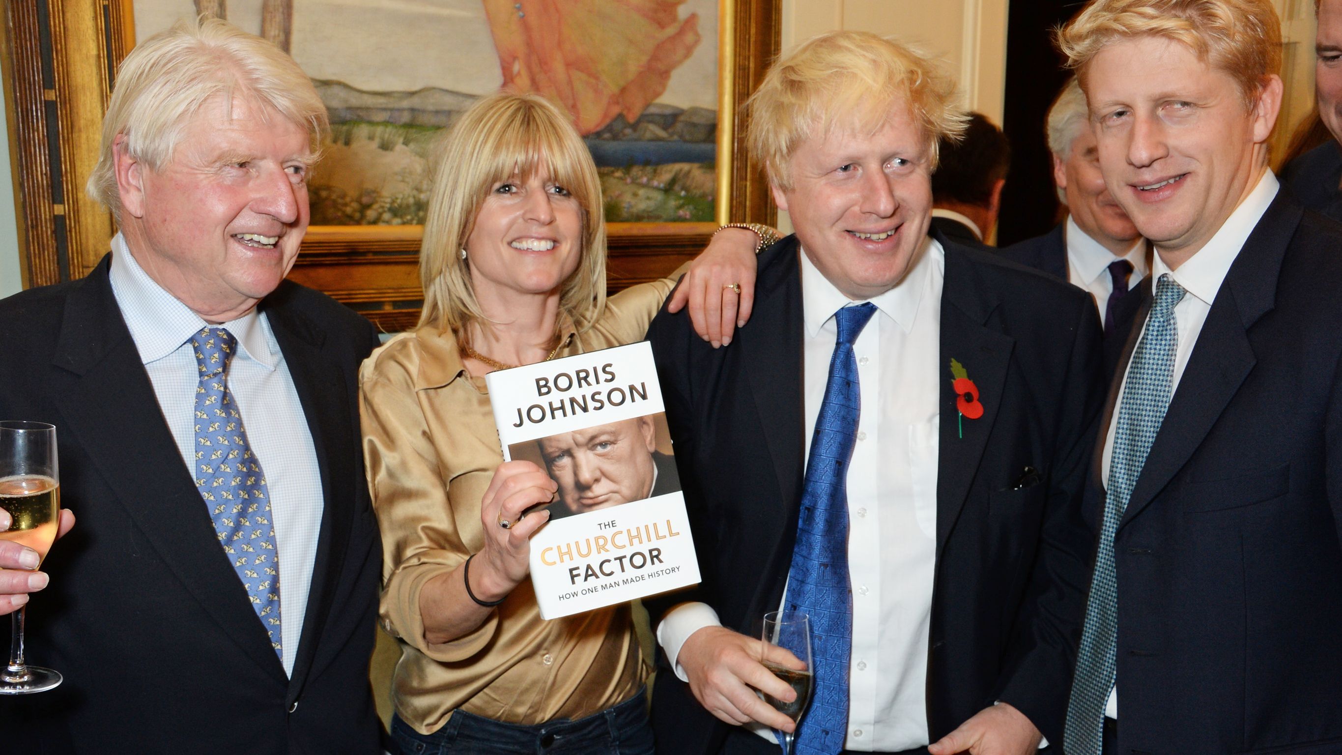 Johnson poses with his father, Stanley, and his siblings, Rachel and Jo, at the launch of his new book in October 2014. Stanley Johnson was once a member of the European Parliament.