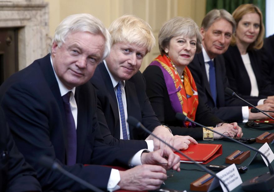 Johnson sits next to Prime Minister Theresa May during a Cabinet meeting in November 2016. Johnson was May's foreign secretary for two years before resigning over her handling of Brexit.