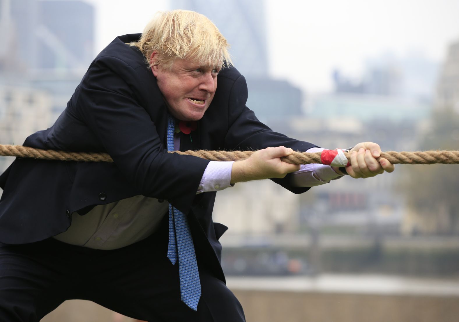 Johnson takes part in a charity tug-of-war with British military personnel in October 2015.