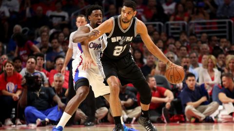 Tim Duncan controls the ball against DeAndre Jordan of the Los Angeles Clippers during the 2015 NBA Playoffs.