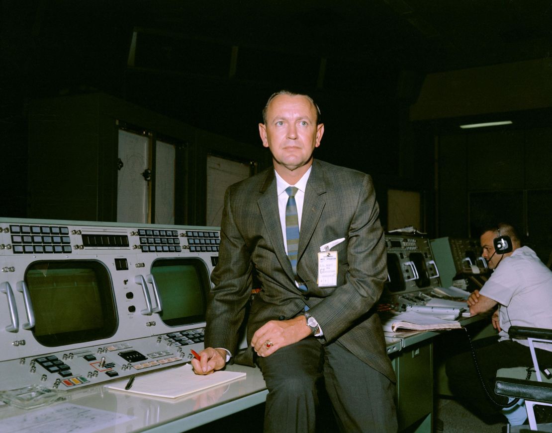 Kraft seen at his flight director console in the Mission Control Center during Gemini-Titan V flight simulation.