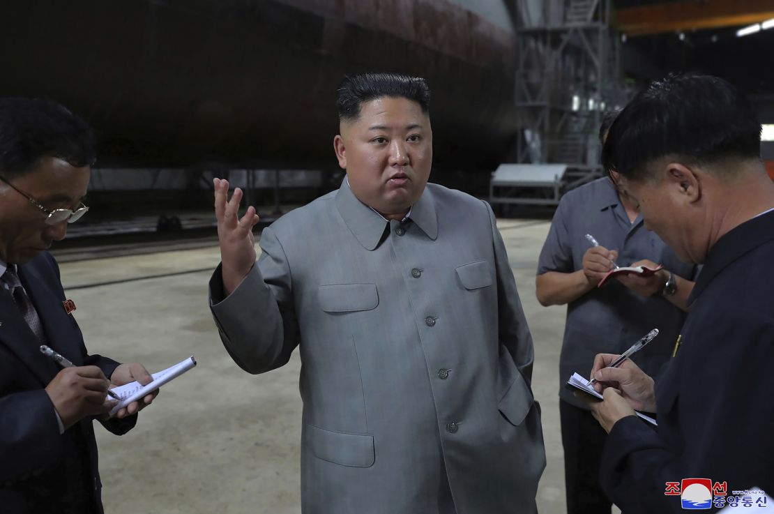 North Korea's state-run news agency KCNA released this image of what it says is Kim Jong Un inspecting a submarine.