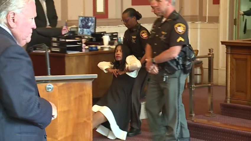 Former judge Tracie Hunter was dragged out of an Ohio courtroom after being sentenced.