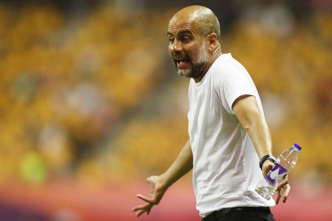 Guardiola reacts from the touchline during City's Premier League Asia Trophy final against Wolves. 