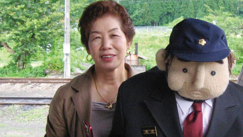 <strong>The creator: </strong>Today, visitors from around the world come to the village to see the dolls. "Before the scarecrows, it was just an ordinary village no one really cared about," says  Tsukimi Ayano, seen here posing with one of her creations. 