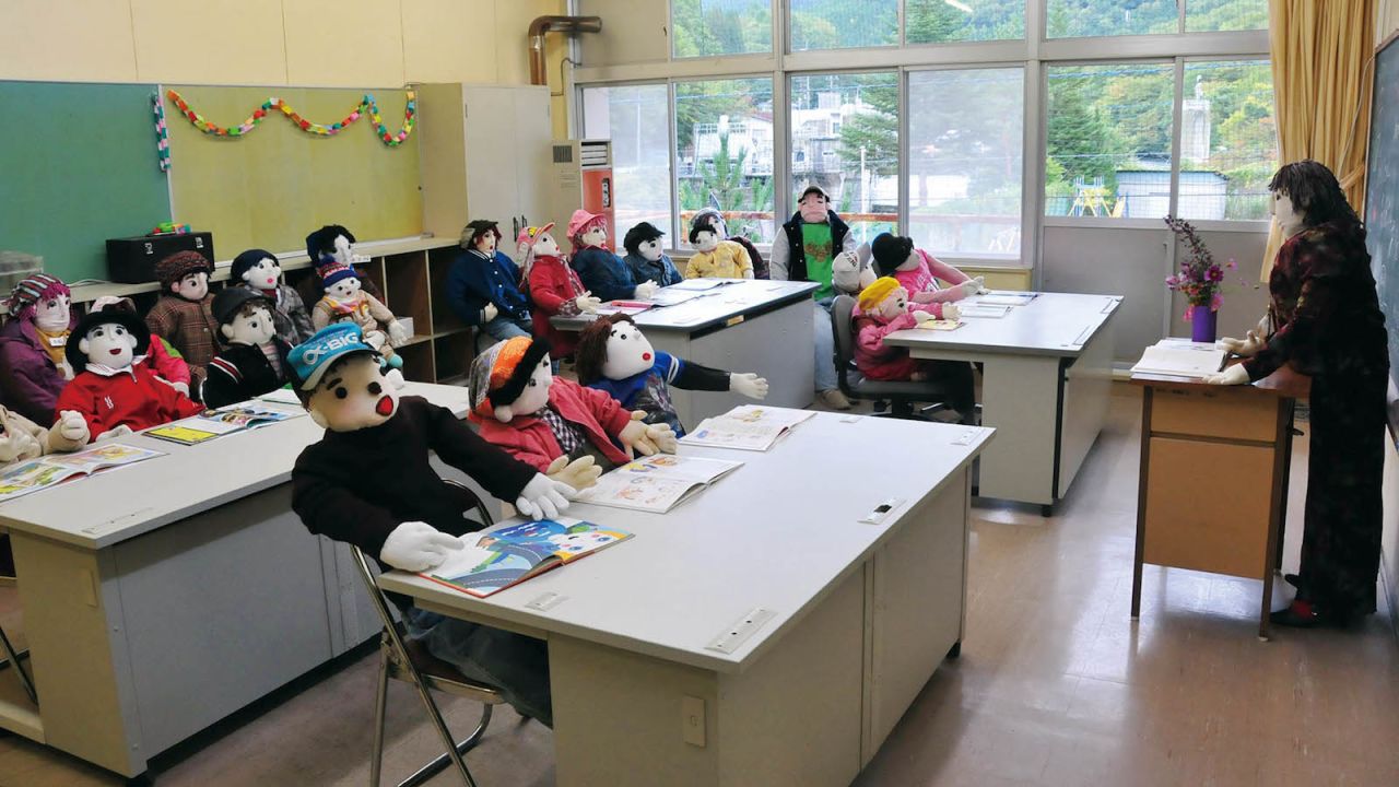 Nagoro's former elementary school is now filled with 12 scarecrow pupils and a teacher. 