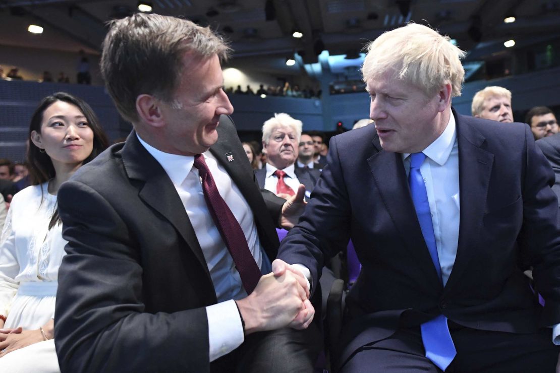 Jeremy Hunt (left) congratulates Boris Johnson after the announcement of the result on July 23.