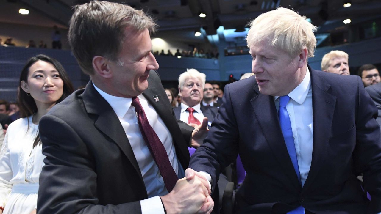Jeremy Hunt (left) congratulates Boris Johnson after the announcement of the result on July 23.