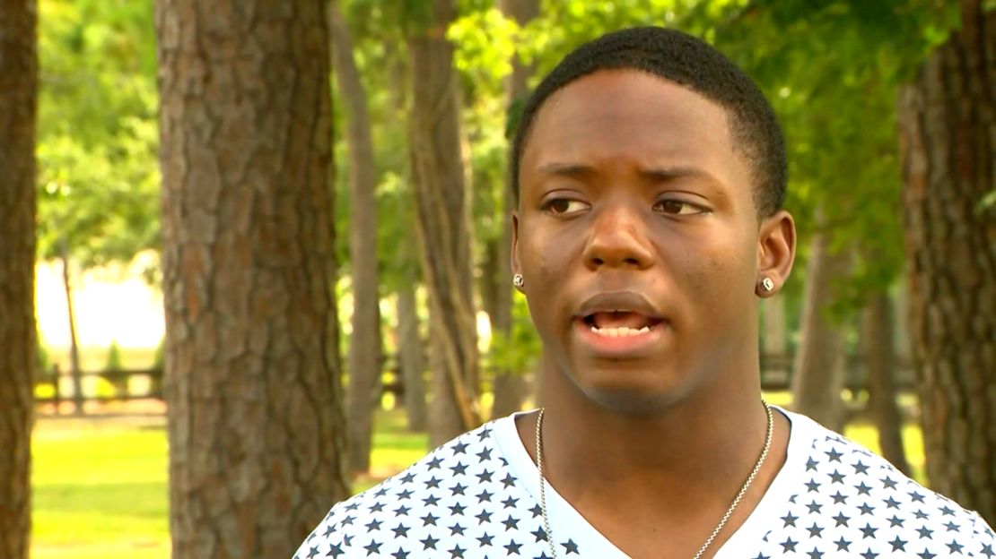 Grant Brown saved young his neighbor who was being attacked by a dog.