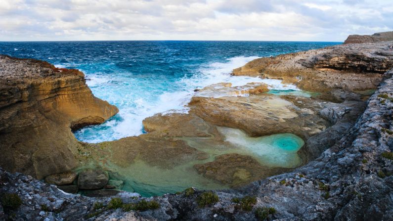 <strong>Queen's Baths, Eleuthera, Bahamas:</strong> Inundated at high tide, the water left in the Queen's Baths as the tide recedes is warmed by the searing Caribbean sun. Steer clear of the spot at high tide or when the surf is rough.