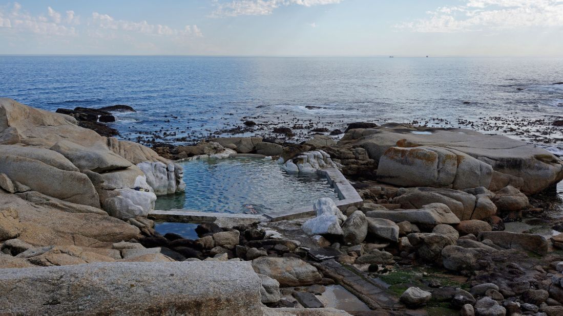 <strong>Saunders Rock, Cape Town, South Africa: </strong>Saunders Rock at Bantry Bay is home to a perfect small pool surrounded by granite boulders that keeps swimmers sheltered from the often harsh wind. 
