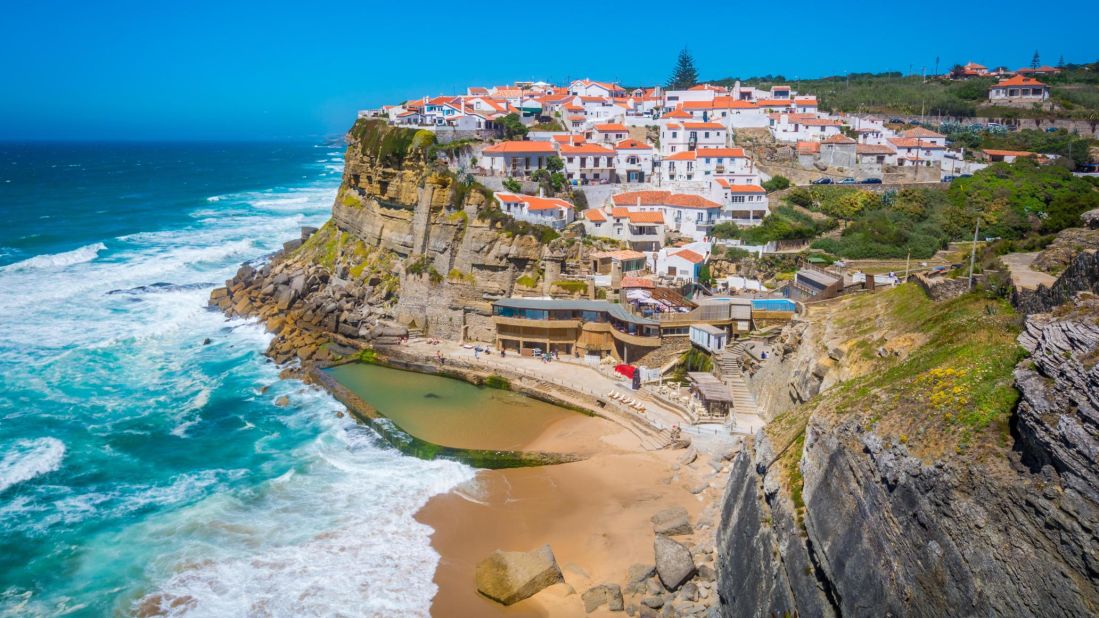 <strong>Azenhas do Mar, Sintra, Portugal: </strong>An hour's drive north of Lisbon, Azenhas do Mar is home to a natural pool, cut into the base of the cliffs, that makes this pretty town especially worth visiting. 