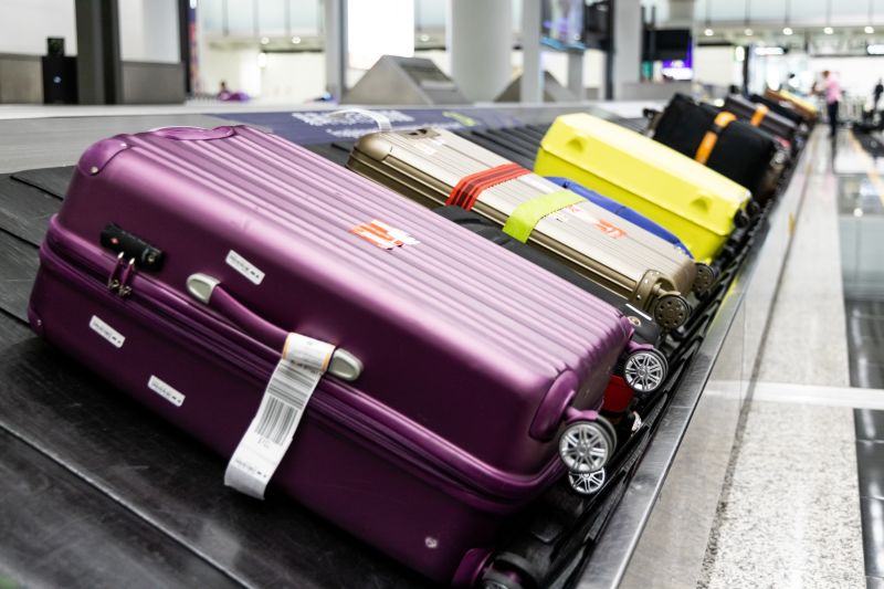 Baggage Chaos at Airports Getting So Bad Flyers Turning to Tracking Devices  - Bloomberg