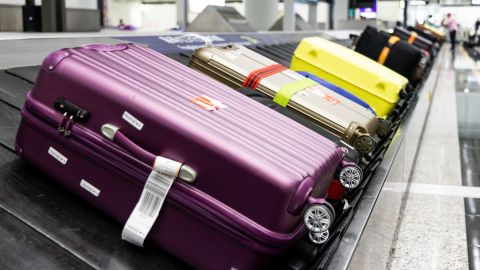 Higher fees for checked bags is one way airlines could offset fuel costs.