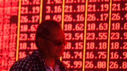 HANGZHOU, CHINA - JUNE 20: An investor watches the electronic board at a stock exchange hall on June 20, 2019 in Hangzhou, Zhejiang Province of China. Chinese shares rose on Thursday. The Shanghai Composite Index went up 69.32 points, or 2.38 percent, to close at 2,987.12. The Shenzhen Component Index rose 209.23 points, or 2.34 percent, to close at 9,134.96 points. (Photo by Long Wei/VCG via Getty Images)