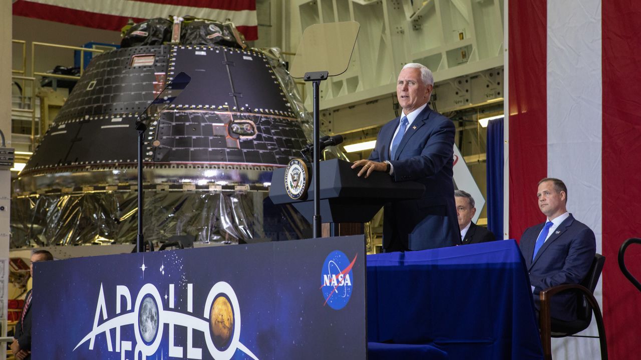 Vice President Mike Pence at Kennedy Space Center on the Apollo 11 anniversary, next to the completed Orion crew capsule.