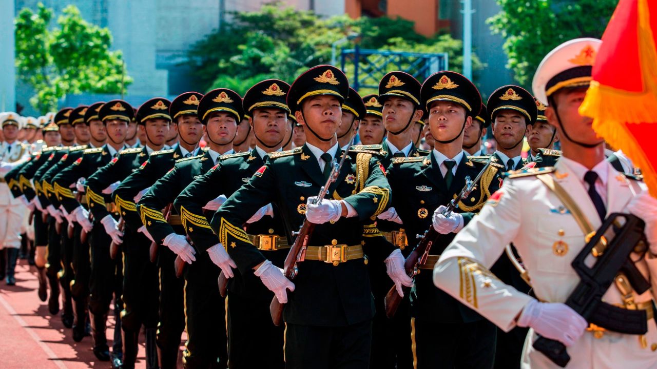 Soldiers of the PLA march during an open day at the Ngong Shuen Chau Barracks in Hong Kong on June 30.