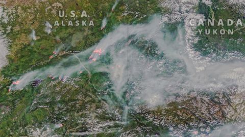 Satellite images show smoke billowing across Greenland and Alaska as wildfires ravage the region. 