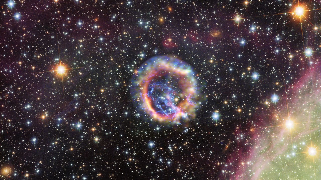 This remnant of a supernova was produced by a massive exploding star in the Small Magellanic Cloud nearby.