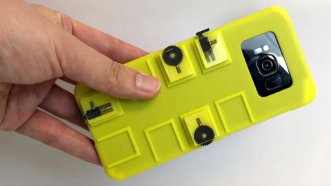 A prototype case lets you use buttons and dials to interact with your smartphone. It was created by researchers at Snap and Columbia University.