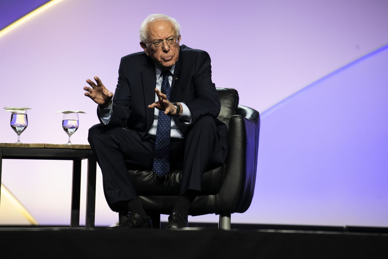 Sanders is seen on stage.
