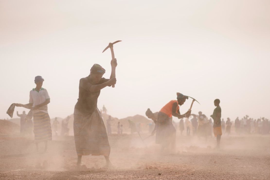 Land cultivation in Burkina Faso to prepare the earth for saplings.