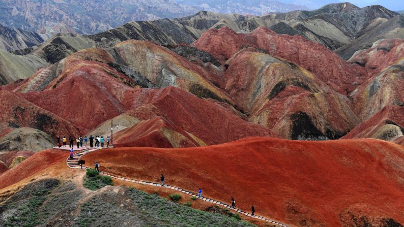 <strong>Zhangye National Geopark:</strong> Zhangye National Geopark in Gansu, China, is famous for its Danxia landform. It's a stunning landscape of red-colored sandstone formed in the Cretaceous age. 