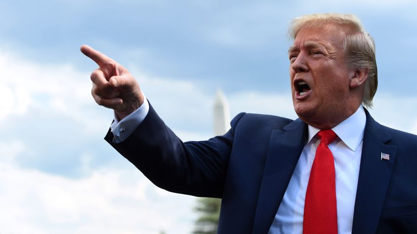 US President Donald Trump gestures as he speaks to members of the press prior to departing from the South Lawn of the White House in Washington, DC, July 24, 2019. (Photo by Roberto SCHMIDT / AFP)        (Photo credit should read ROBERTO SCHMIDT/AFP/Getty Images)