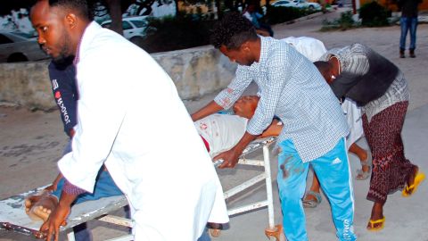 Medical workers help a civilian who was wounded in a suicide bombing in Mogadishu, Somalia, on Wednesday.